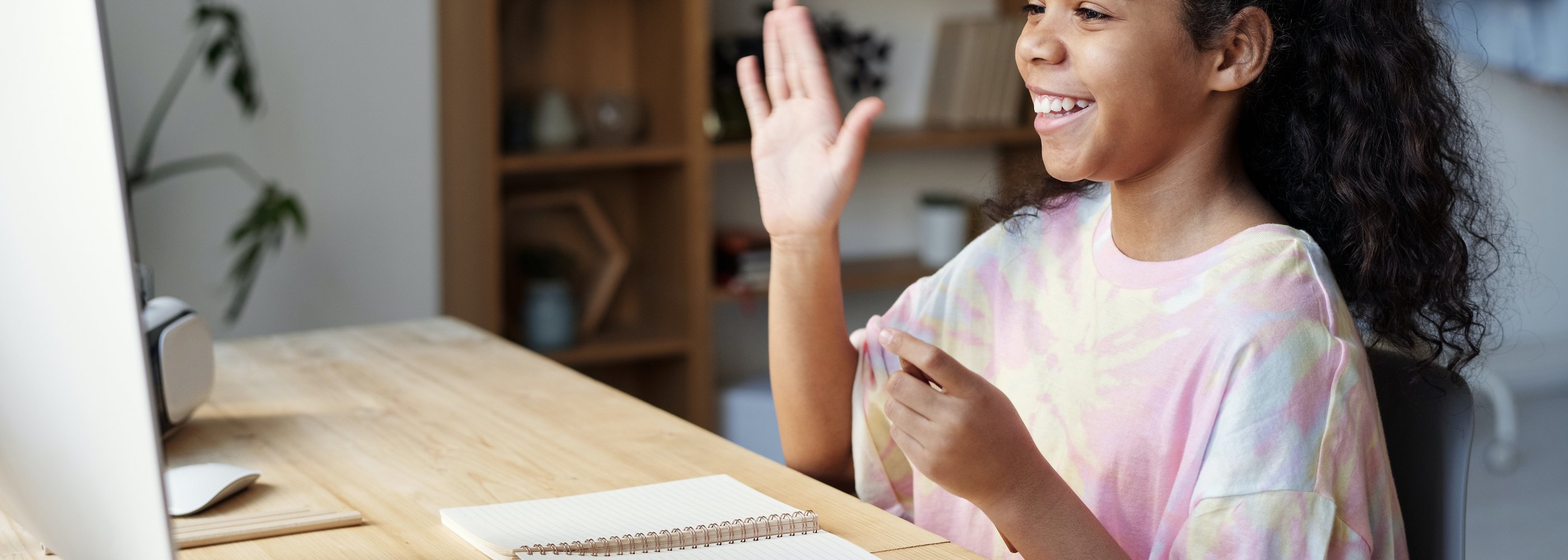 girl with hand up